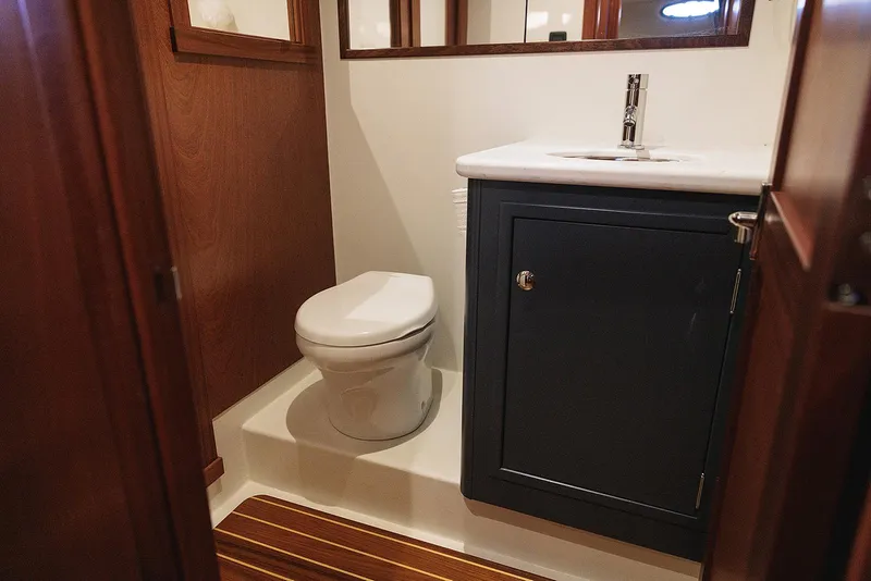 Slide: The Image of Luxurious bathroom in 2022 Composite Yacht CY46 with modern fixtures and wood accents. - 24