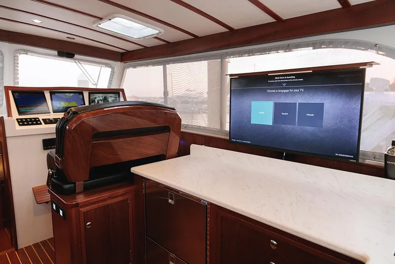 Slide: The Image of Luxurious interior of 2022 Composite Yacht CY46 with modern navigation and entertainment systems. - 28