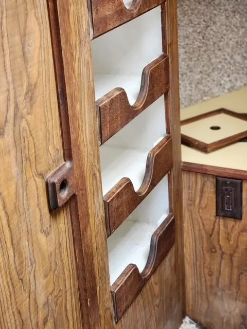 Slide: The Image of 1977 Bombay Express wooden cabinet with open shelves and vintage design. - 12