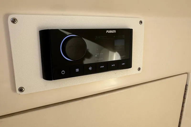 Slide: The Image of Fusion audio system installed on a 2004 Boston Whaler 270 Outrage boat. - 32