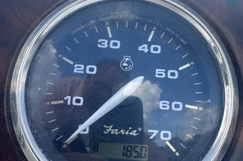 Slide: The Image of Close-up of a Faria boat speedometer, showing 1850 hours, in a 2012 Hurricane SD 201. - 14