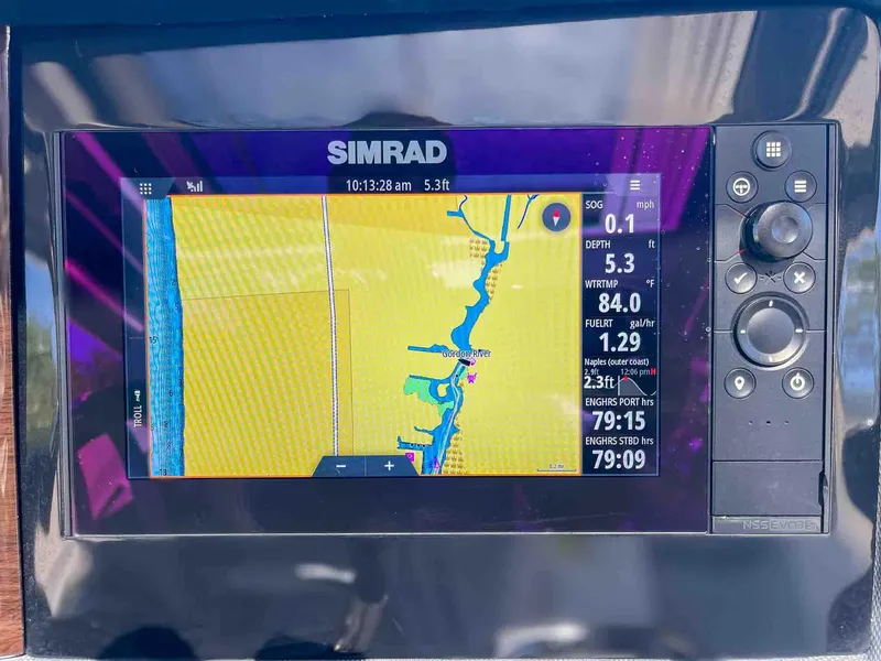 Slide: The Image of Simrad navigation display on 2021 Chaparral 300 OSX boat, showing map and data. - 11