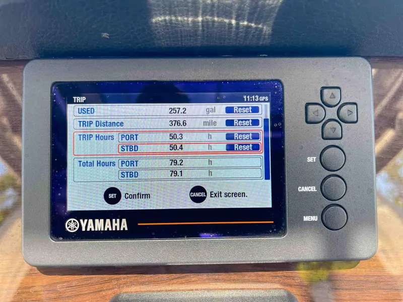 Slide: The Image of Yamaha display showing trip data on a 2021 Chaparral 300 OSX boat. - 14