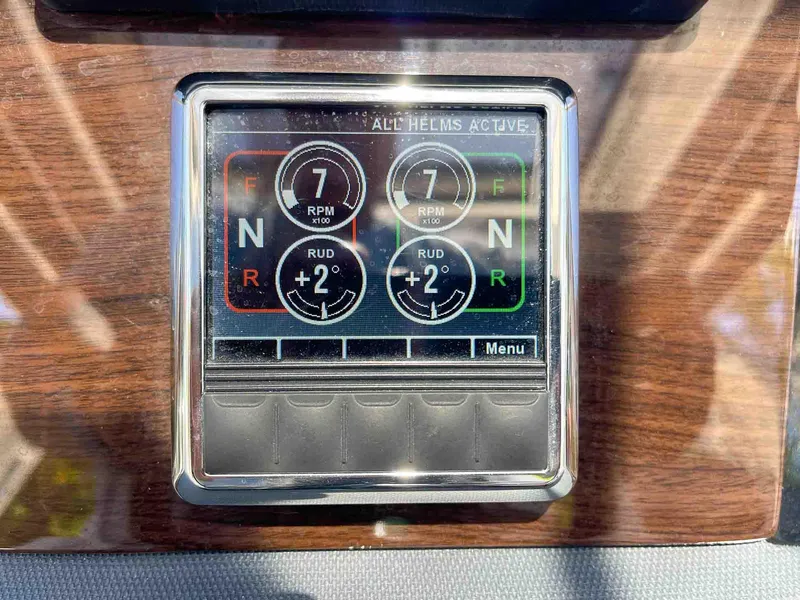 Slide: The Image of Digital control panel on 2021 Chaparral 300 OSX boat dashboard. - 15
