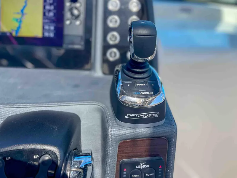 Slide: The Image of Control panel of 2021 Chaparral 300 OSX boat with Optimus 360 joystick. - 17
