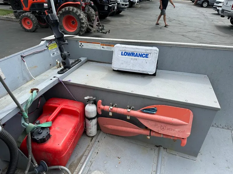 Slide: The Image of Interior of a 2022 Lund WC-14 boat with equipment and Lowrance device. - 8