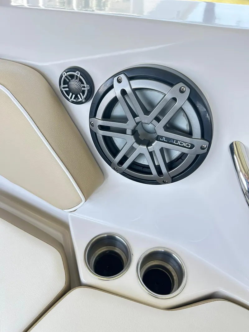 Slide: The Image of Speaker system on 2016 Scarab 255 H.O. Platinum boat interior. - 20