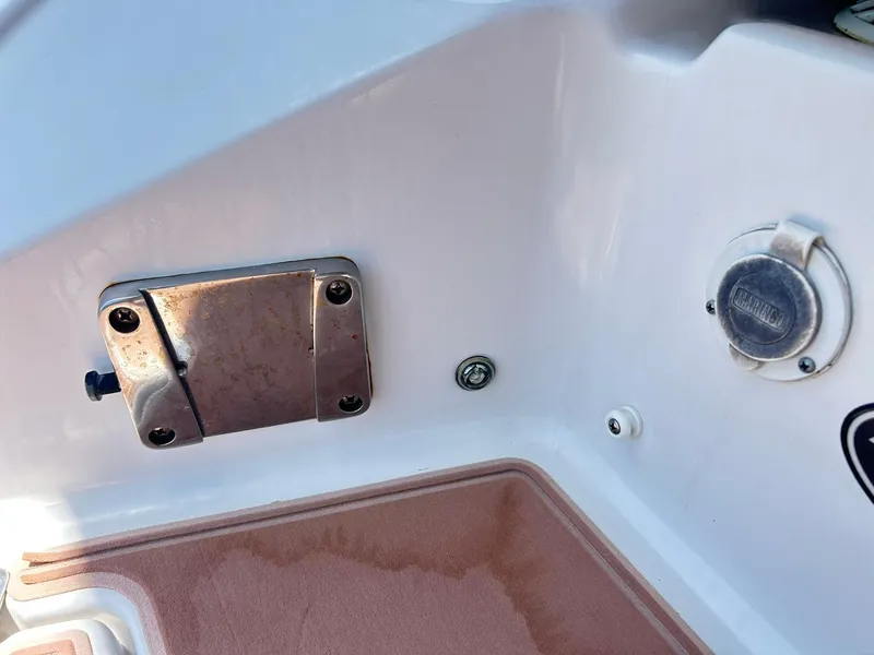 Slide: The Image of Interior detail of a 2016 Scarab 255 H.O. Platinum boat showing metal fixtures. - 37