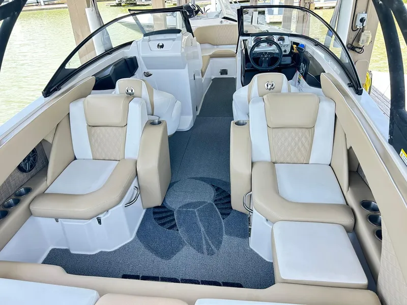 Slide: The Image of 2016 Scarab 255 H.O. Platinum boat interior with beige seating and modern design. - 39