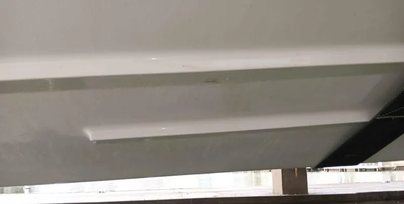 Slide: The Image of 2016 Scarab 255 H.O. Platinum boat hull detail, showcasing sleek design and craftsmanship. - 46