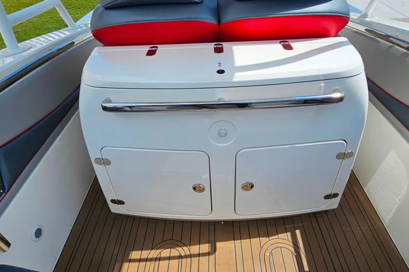 Slide: The Image of Interior of 2012 Cougar R10 Rigid Inflatable boat with cushioned seating and storage. - 18