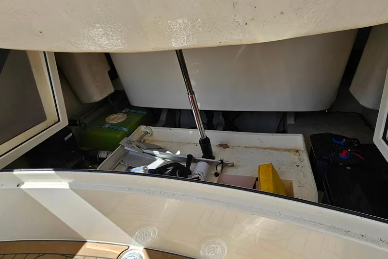 Slide: The Image of 2012 Cougar R10 Rigid Inflatable boat interior showing storage and equipment compartments. - 21