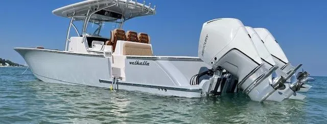 Slide: The Image of 2022 Valhalla Boatworks V-37 in water, showcasing sleek design and powerful engines. - 0