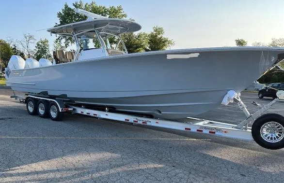 Slide: The Image of 2022 Valhalla Boatworks V 37 on trailer, parked outdoors, side view. - 10