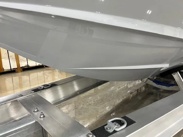 Slide: The Image of 2022 Valhalla Boatworks V 37 hull on trailer, showcasing sleek design and craftsmanship. - 14