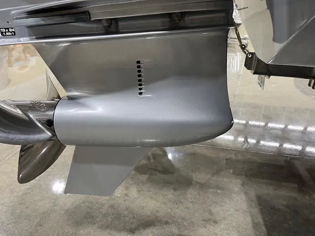 Slide: The Image of 2022 Valhalla Boatworks V 37 outboard motor detail, showcasing sleek design and propeller. - 17