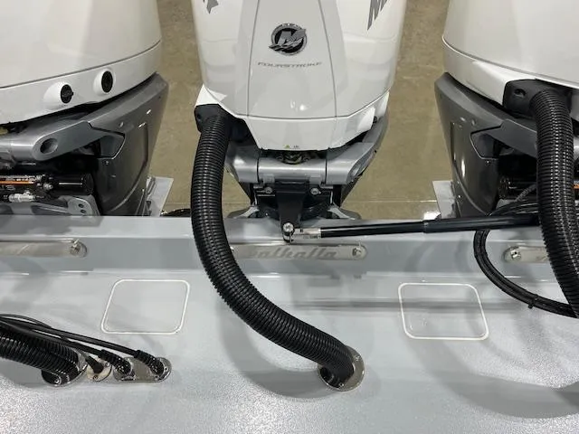 Slide: The Image of Triple outboard engines on a 2022 Valhalla Boatworks V 37, showcasing powerful marine performance. - 20