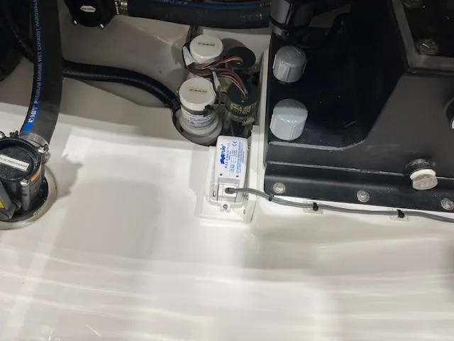 Slide: The Image of Engine compartment of 2022 Valhalla Boatworks V 37, showcasing mechanical components and wiring. - 24