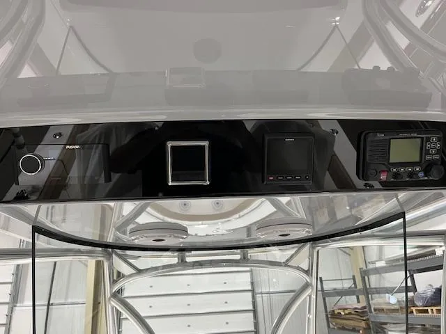 Slide: The Image of 2022 Valhalla Boatworks V 37 console with modern navigation and communication equipment. - 30