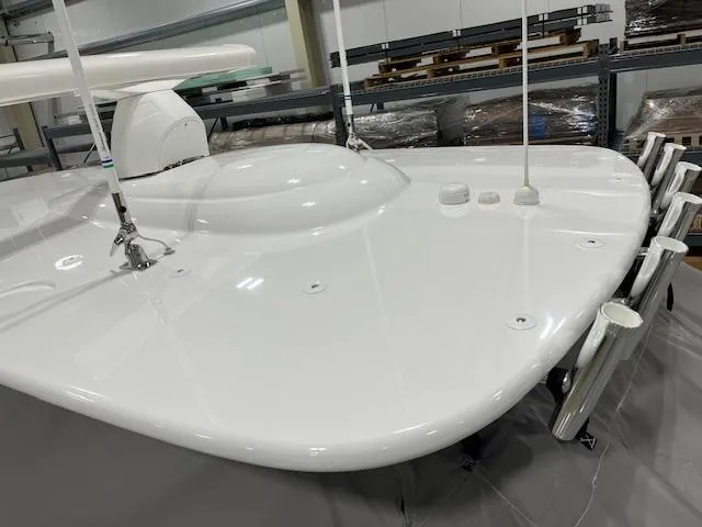 Slide: The Image of 2022 Valhalla Boatworks V 37 deck in a storage facility, showcasing sleek design and equipment. - 31