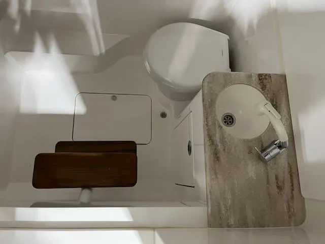 Slide: The Image of 2022 Valhalla Boatworks V 37 bathroom with toilet and sink. - 32
