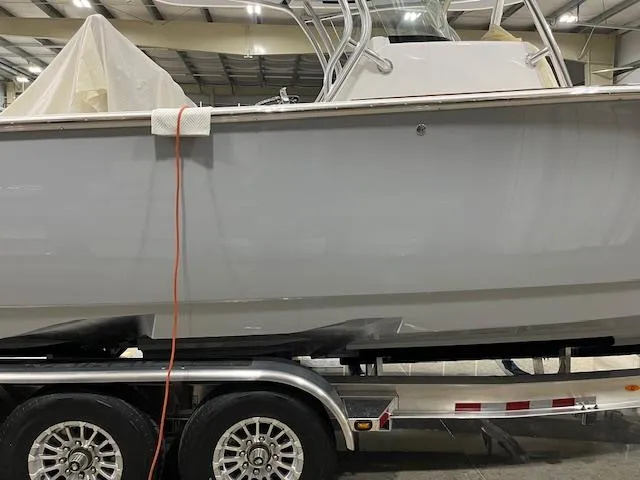 Slide: The Image of 2022 Valhalla Boatworks V 37 on trailer in indoor storage facility. - 38