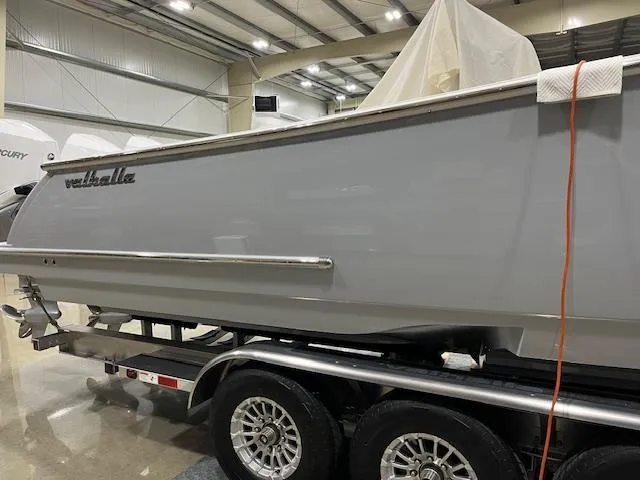 Slide: The Image of 2022 Valhalla Boatworks V 37 on trailer in indoor showroom. - 39