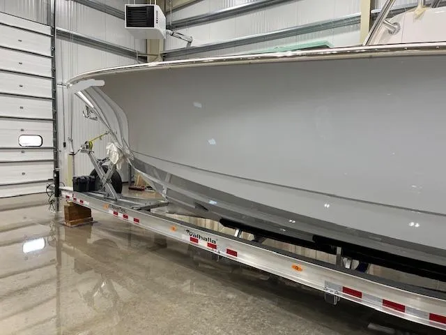 Slide: The Image of 2022 Valhalla Boatworks V 37 on trailer in indoor storage facility. - 41