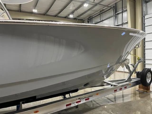 Slide: The Image of 2022 Valhalla Boatworks V 37 on trailer in indoor storage facility. - 42