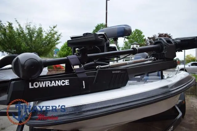 Slide: The Image of 1997 Pro Craft 180 boat with Lowrance Ghost trolling motor, outdoor setting. - 10