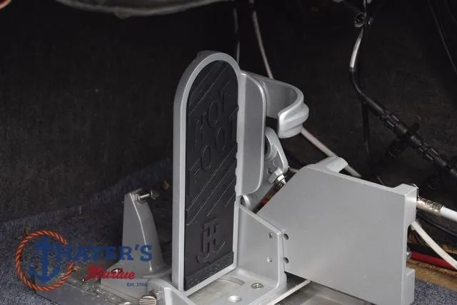 Slide: The Image of Foot pedal assembly in a 1997 Pro Craft 180 boat interior. - 18