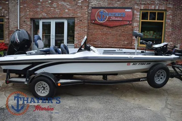 Slide: The Image of 1997 Pro Craft 180 boat on trailer at Thayer's Marine dealership. - 2