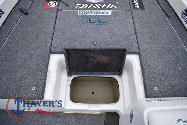 Slide: The Image of 1997 Pro Craft 180 boat deck with storage compartment, featuring Thayer's Marine branding. - 20