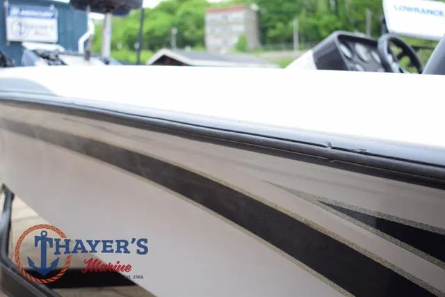 Slide: The Image of 1997 Pro Craft 180 boat side view at Thayer's Marine dealership. - 35