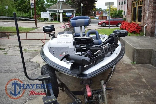 Slide: The Image of 1997 Pro Craft 180 boat on trailer, equipped with Lowrance electronics, parked at Thayer's Marine. - 7