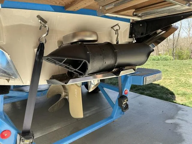 Slide: The Image of 2022 MasterCraft X24 boat underside showing propeller and exhaust system. - 23