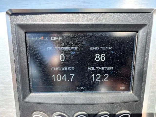 Slide: The Image of Dashboard display of a 2018 MasterCraft NXT22 showing engine metrics and hours. - 18