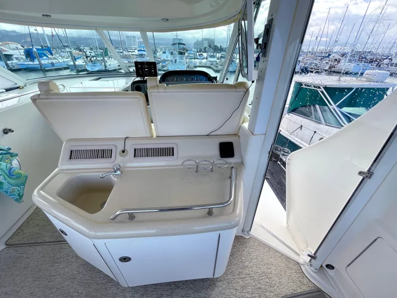 Slide: The Image of 2005 Sea Ray Motor Yacht interior with sink and marina view. - 11