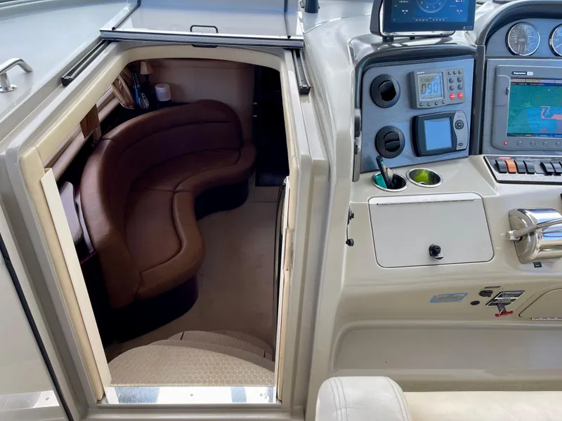 Slide: The Image of 2005 Sea Ray Motor Yacht interior with cockpit and cabin seating area. - 14