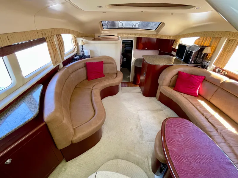 Slide: The Image of Luxurious 2005 Sea Ray Motor Yacht interior with plush seating and elegant design. - 15