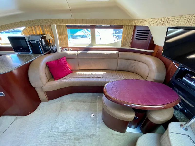 Slide: The Image of Luxurious 2005 Sea Ray Motor Yacht interior with leather seating and modern amenities. - 16