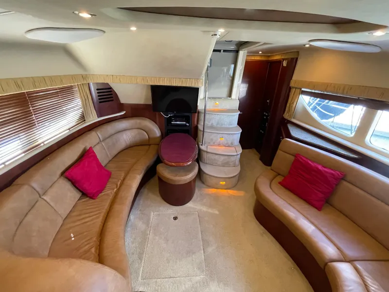 Slide: The Image of Luxurious interior of a 2005 Sea Ray Motor Yacht with plush seating and elegant decor. - 24