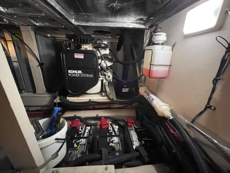 Slide: The Image of Engine room of a 2005 Sea Ray Motor Yacht with Kohler power systems and batteries. - 34