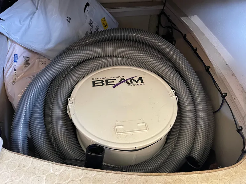 Slide: The Image of Central vacuum system in 2005 Sea Ray motor yacht storage compartment. - 36