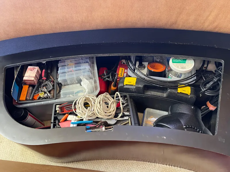 Slide: The Image of Storage compartment in a 2005 Sea Ray Motor Yacht with tools and supplies. - 37