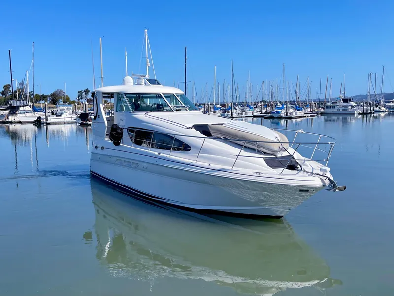 Slide: The Image of 2005 Sea Ray Motor Yacht docked in a marina under clear blue skies. - 4