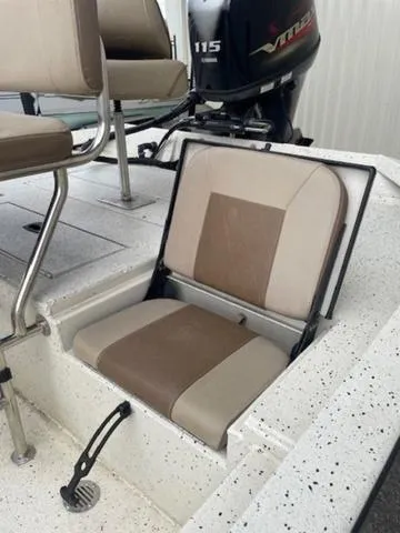 Slide: The Image of 2019 Xpress SW20B boat with foldable seat and Yamaha 115 outboard motor. - 8