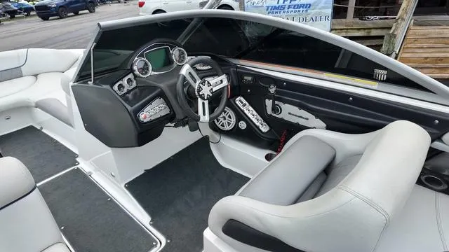 Slide: The Image of 2011 MasterCraft X45 boat interior with modern dashboard and seating. - 15
