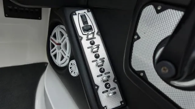 Slide: The Image of Control panel and speaker on a 2011 MasterCraft X45 boat interior. - 20