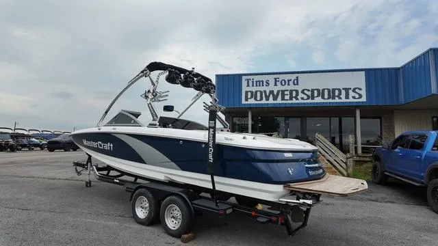 Slide: The Image of 2011 MasterCraft X45 boat on trailer at Tims Ford Powersports dealership. - 3